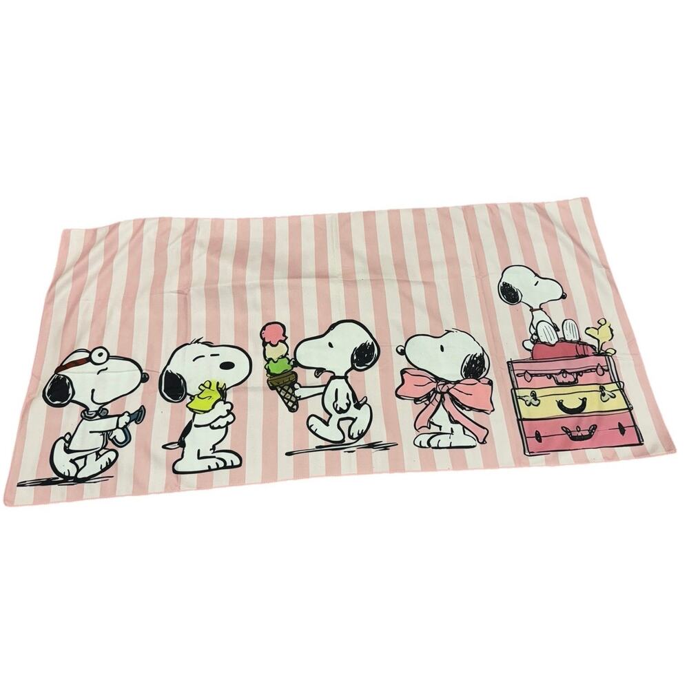 Snoopy in different activities beach towel pink stripes